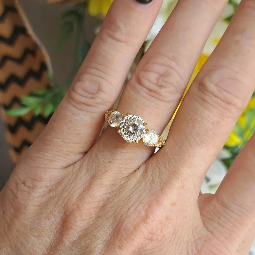 Genuine Moissanite Trilogy Ring In 14k YG Vermeil.